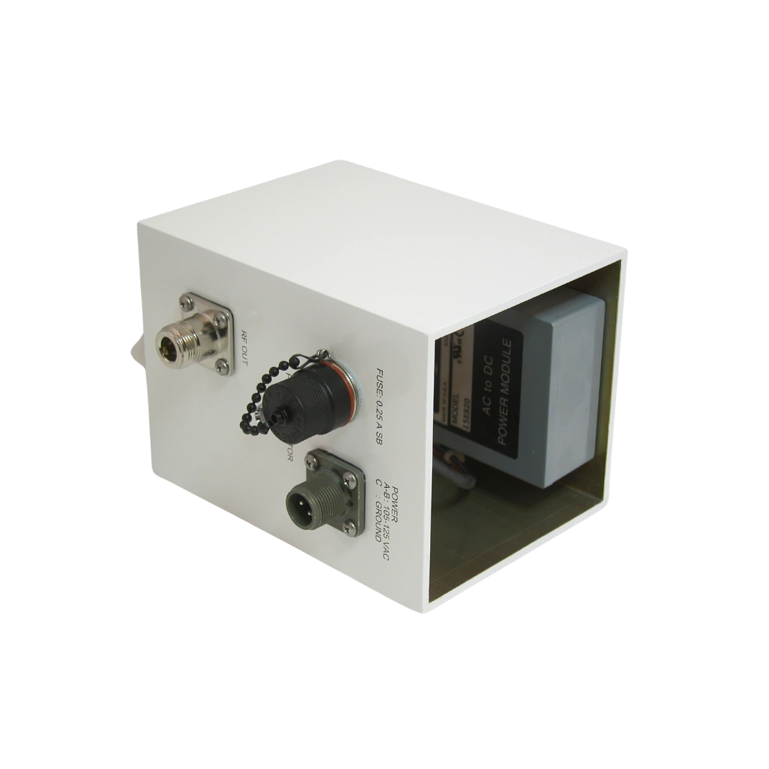 White metal enclosure with RF output connector, power input, and a fuse; a DC power module sits inside the front opening.